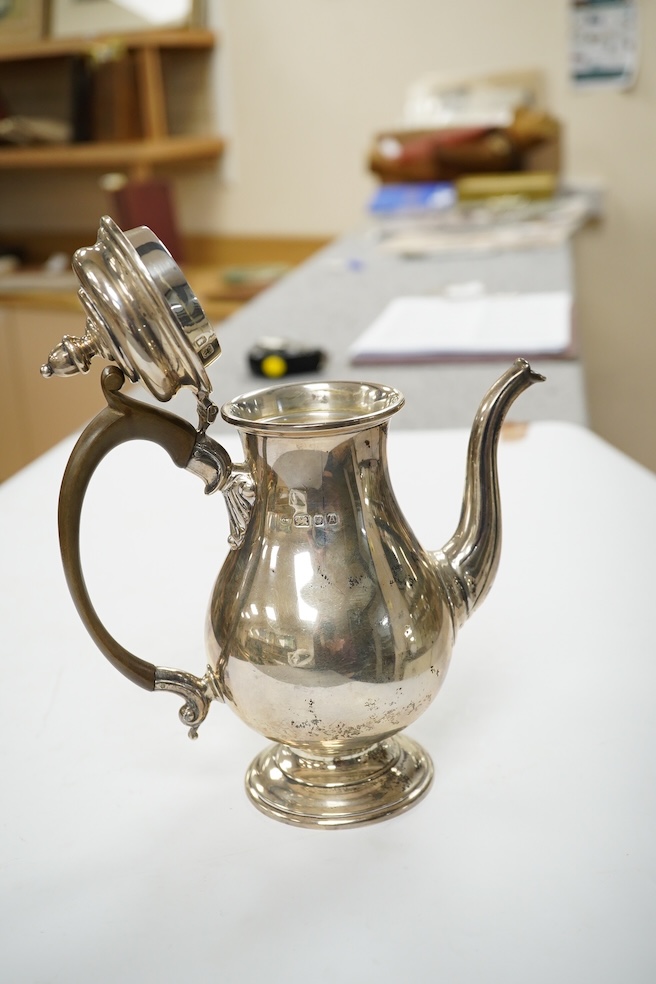 A George VI small silver coffee pot, maker CE?, London, 1936, height 20cm, gross weight 15.3oz. Condition - fair